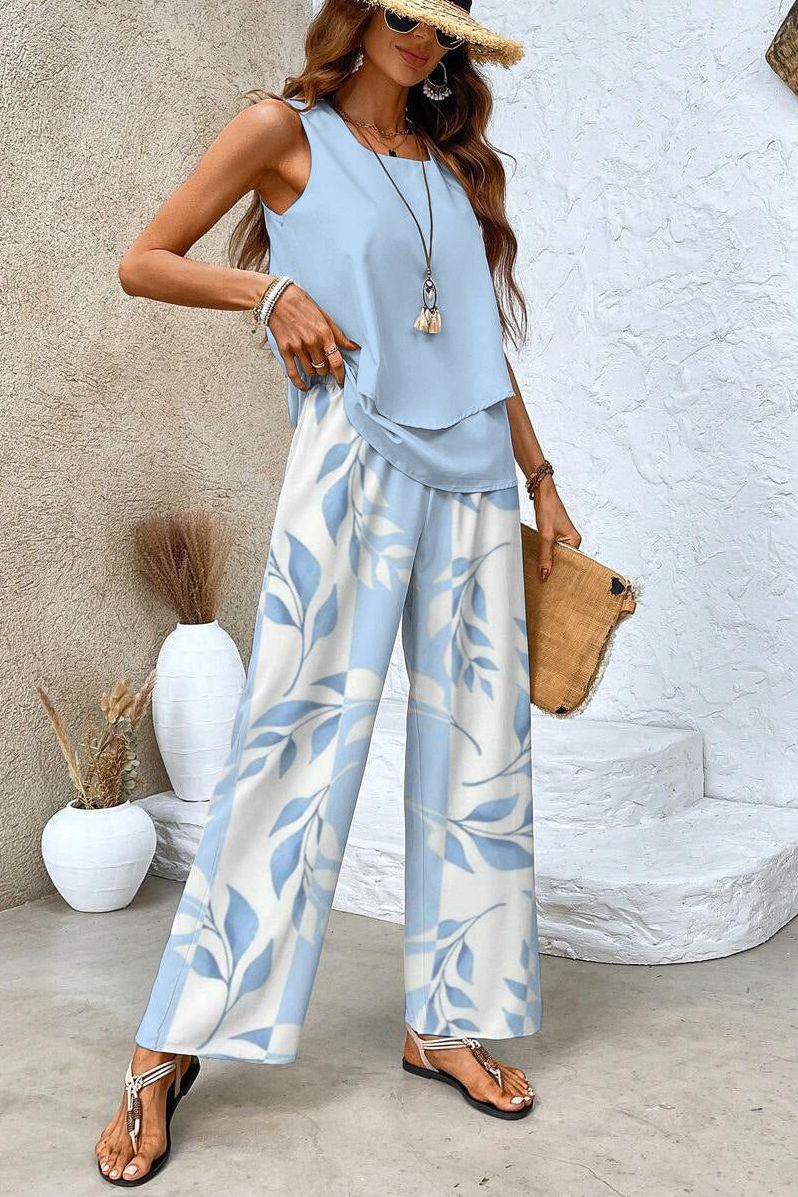 Comfortable women's floral trouser set. Casual chic two-piece outfit, perfect for relaxed summer style.