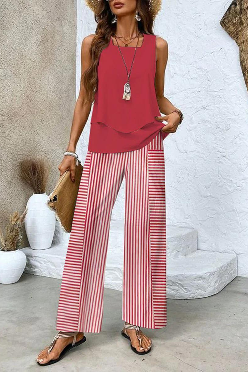 Elegant women's floral trousers. Coordinated with a matching top for a stylish two-piece outfit.