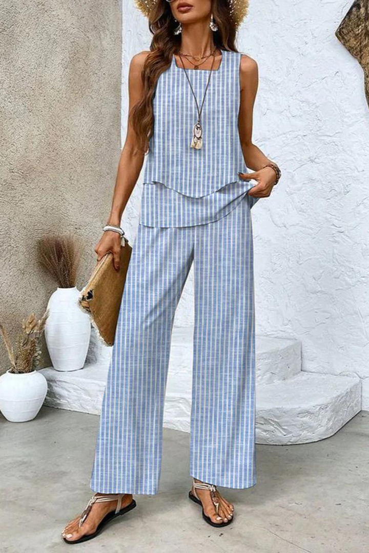 Spring/summer women's floral top & trouser set. Stylish, comfortable, and elegant coordinated outfit.
