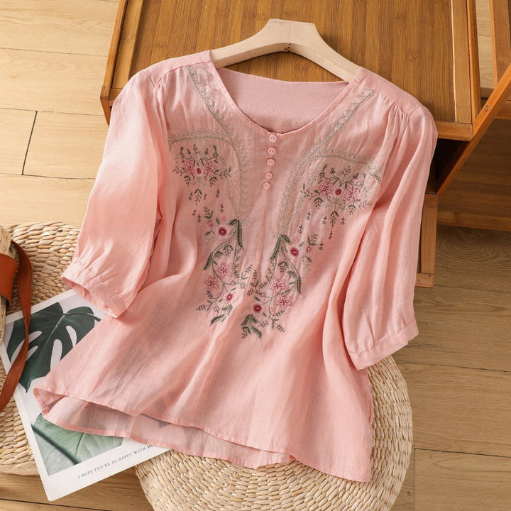 Casual elegant women's floral blouse with a relaxed fit, V-neck, and long sleeves, perfect for everyday wear.