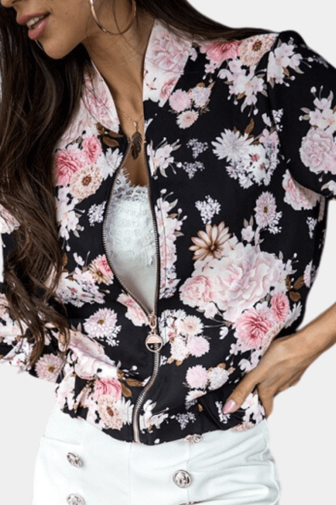 Women's slim fit floral stretch jacket with vibrant print, ideal for active or casual wear. Comfortable outerwear.