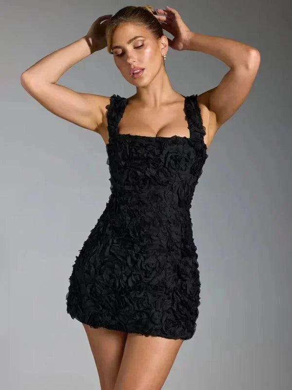 Elegant women's floral mini dress with textured detail, perfect for parties.