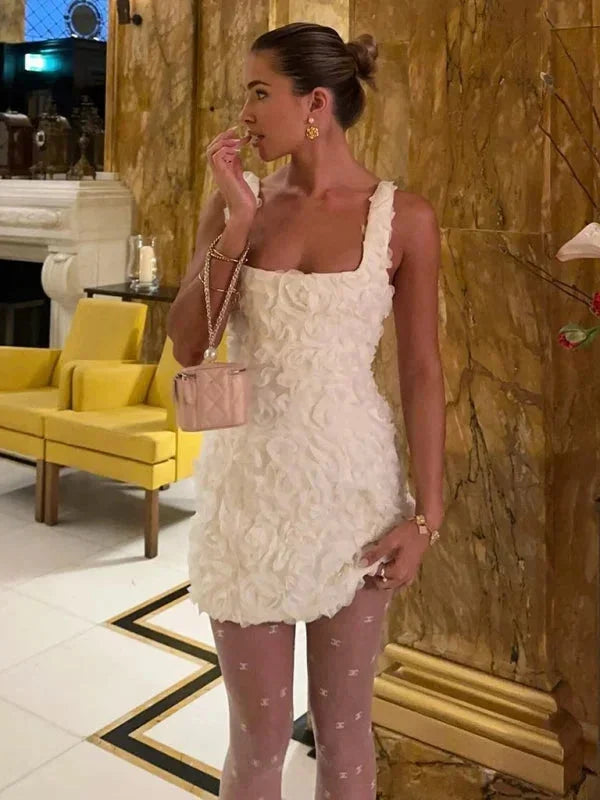 Women's slim fit floral textured mini dress, perfect for cocktail parties.
