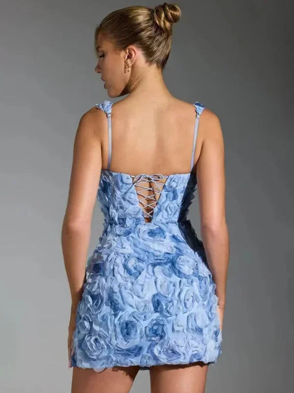 Floral textured mini dress for women, an elegant sleeveless party outfit.