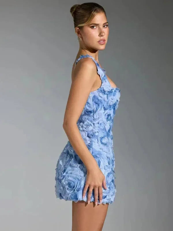 Vibrant floral textured mini dress for women, ideal for glamorous occasions.