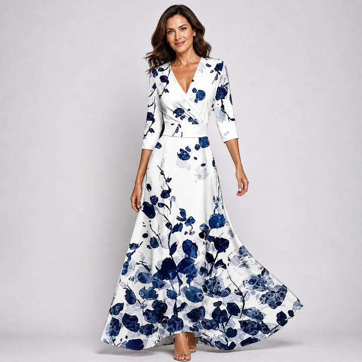 Elegant women's flowing floral maxi dress with a flattering V-neck, ideal for special occasions & summer fashion.