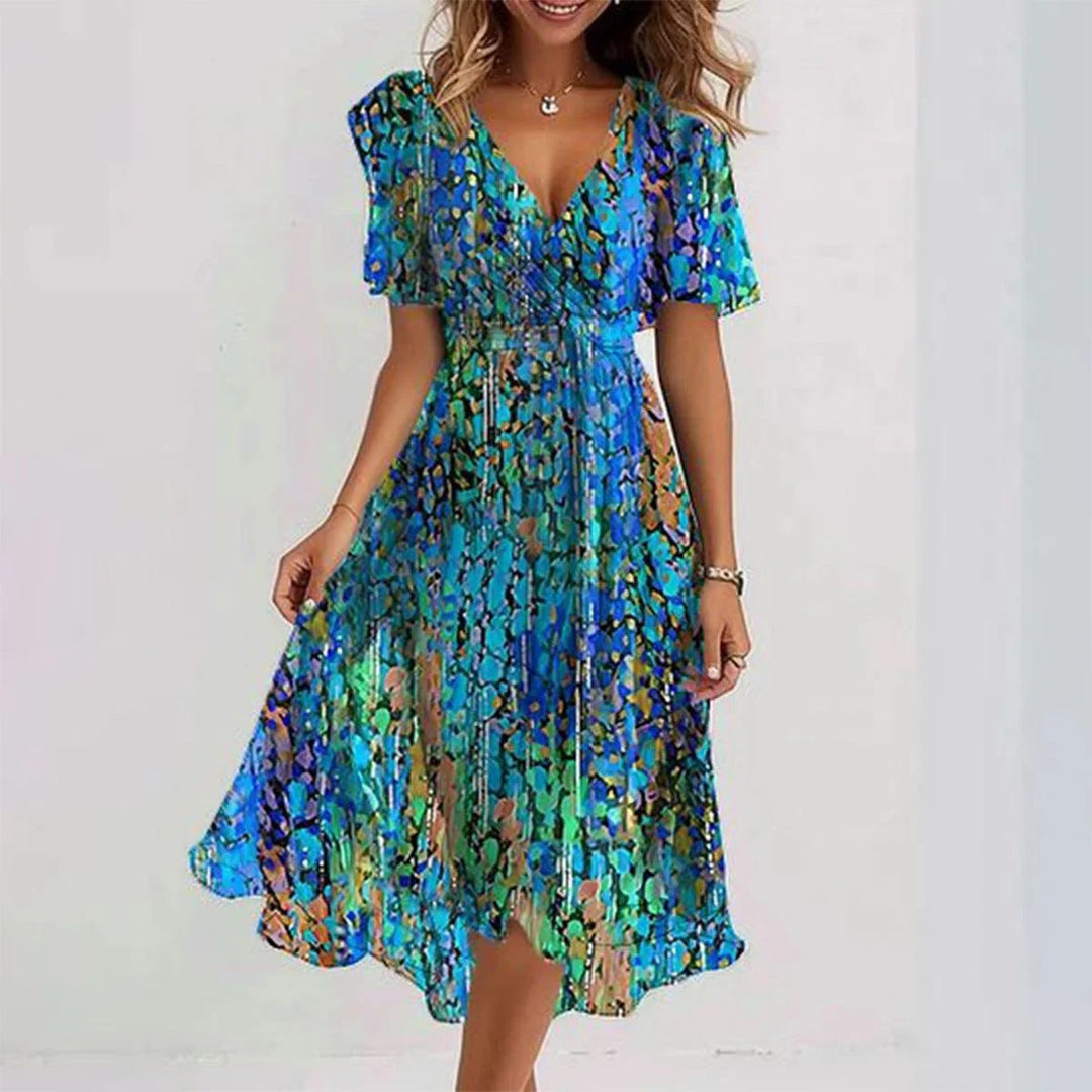 Lightweight women's floral wrap midi dress with comfortable flutter sleeves, a stylish choice for summer fashion.