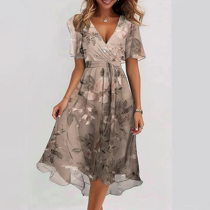V-neck floral wrap midi dress for women, with delicate flutter sleeves, a versatile piece for wedding guests.