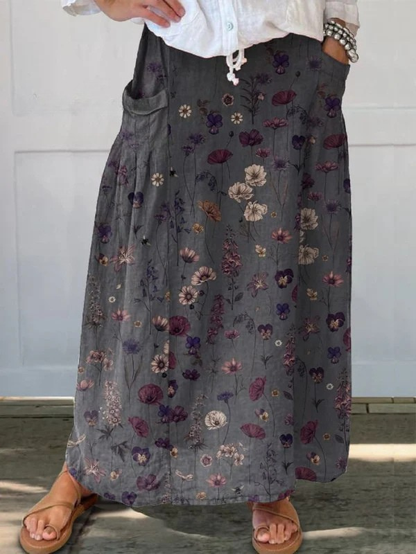 Women's elegant flower art print A-line midi skirt with pockets, perfect for summer & spring casual or bohemian style.