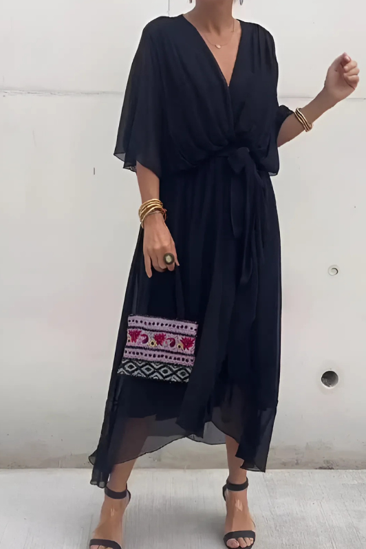 Women's elegant flowing maxi dress in a soft fabric, perfect for evening or formal events.