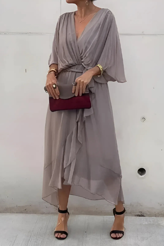 Modest yet elegant women's long flowing maxi dress, ideal for formal occasions or summer evenings.