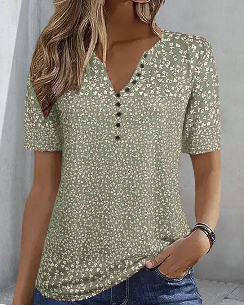 Elegant women's short-sleeve floral shirt. Relaxed fit, breathable summer top for women.