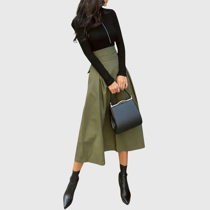 Women's elegant green high-waist pleated midi skirt, perfect for office wear or spring style.