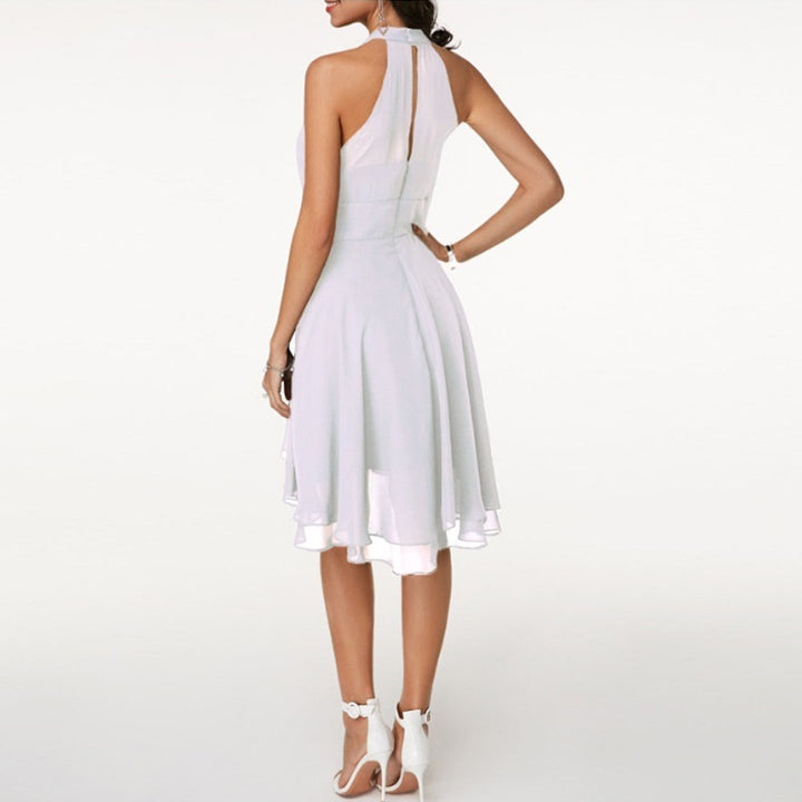 Chic women's mini dress featuring a flattering halter neck design, ideal for summer evenings.