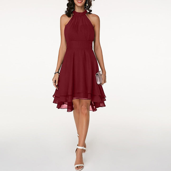 Elegant women's occasion dress; a sleeveless mini with a flattering halter neck & dynamic layered hem.
