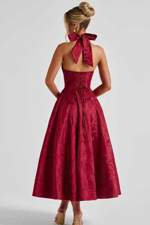 Women's formal evening gown, A-line silhouette with a graceful halterneck, ideal for sophisticated events.