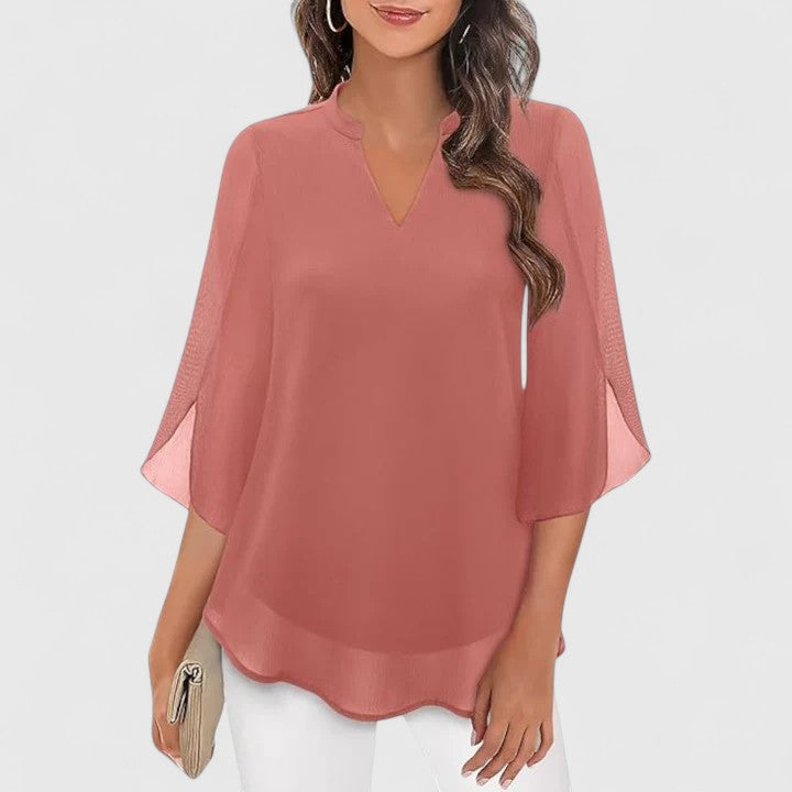 Versatile women's blouse; elegant workwear and sophisticated evening top with long sleeves.