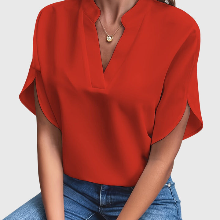 Elegant lightweight long-sleeve women's blouse, ideal for year-round sophisticated styling.