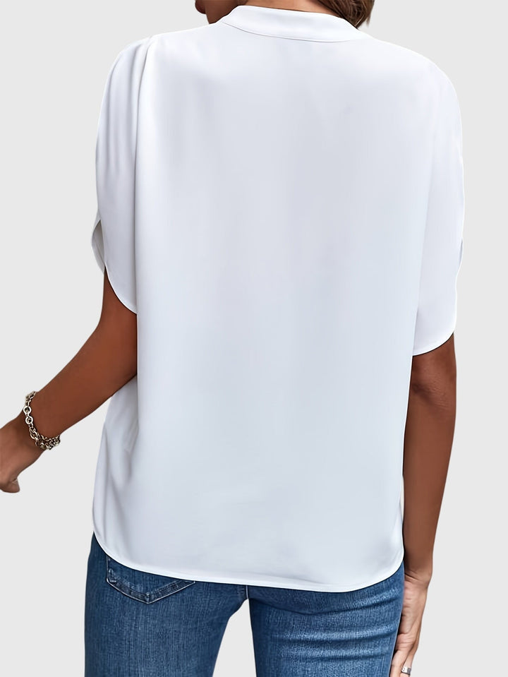 Chic women's work wear blouse, perfect for office attire and professional settings.