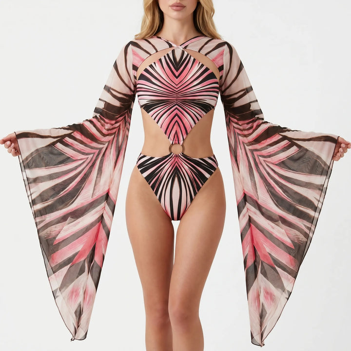 Sophisticated women's long-sleeve cutout monokini, abstract print beachwear for elegant resort.