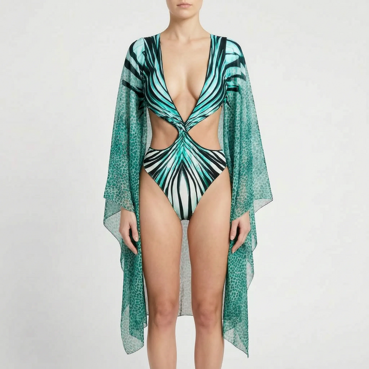 Vacation fashion: women's long-sleeve monokini, stylish cutouts, flared sleeves, and abstract print.