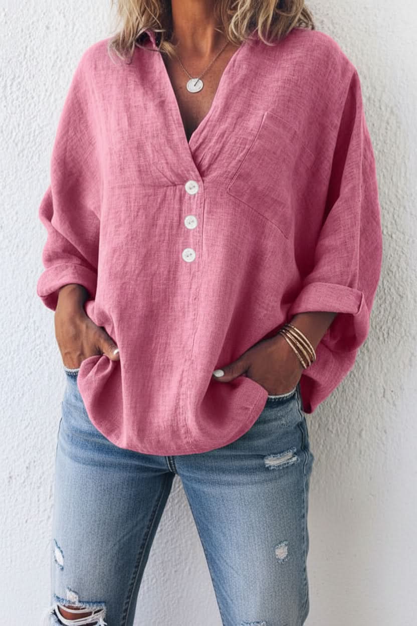 Women's elegant long sleeve top with relaxed fit & stylish open back, perfect for casual or dressed-up occasions.