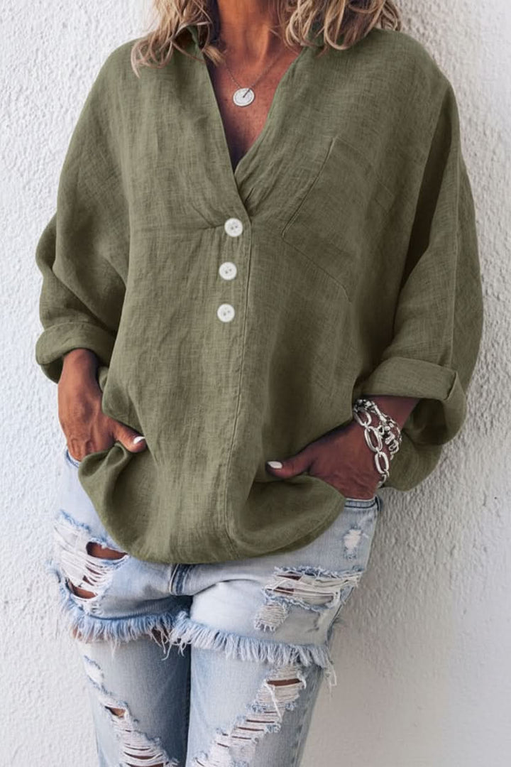 Chic women's casual long sleeve shirt with a sophisticated open back, offering a relaxed and comfortable fit.