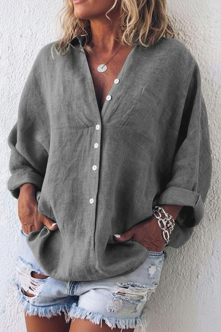 Elegant women's open back long sleeve top, a relaxed fit blouse for versatile styling from day to night.