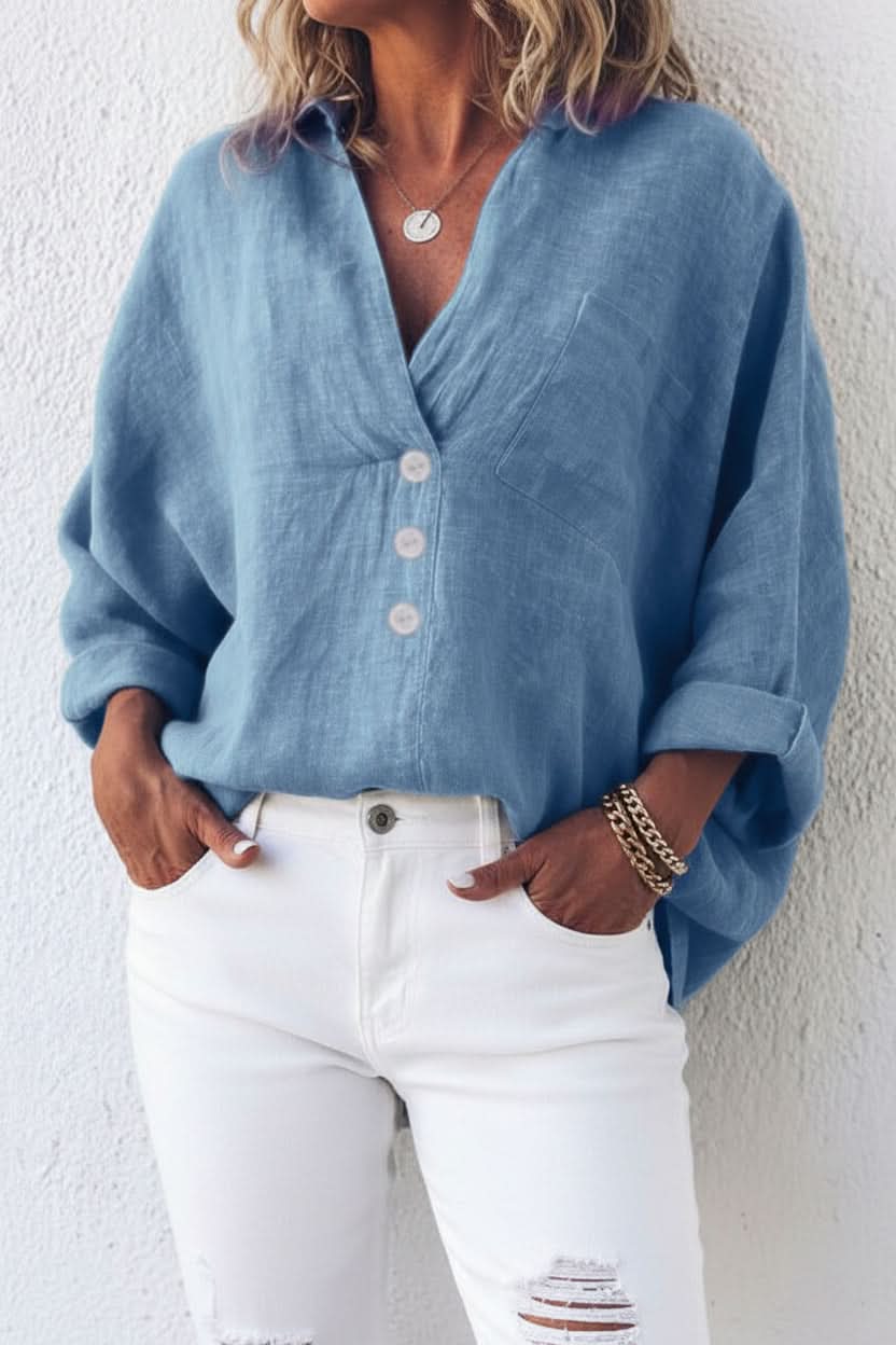 Relaxed fit women's long sleeve top with a fashionable open back, great for a stylish and comfortable look.