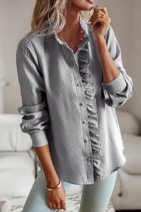 Stylish women's longsleeve shirt, an elegant and versatile blouse for professional or casual outfits.