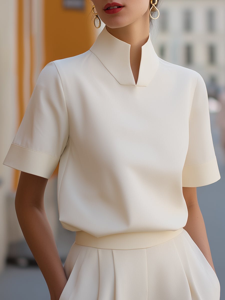 Women's elegant mandarin collar blouse, short sleeve, relaxed fit for office or casual chic.