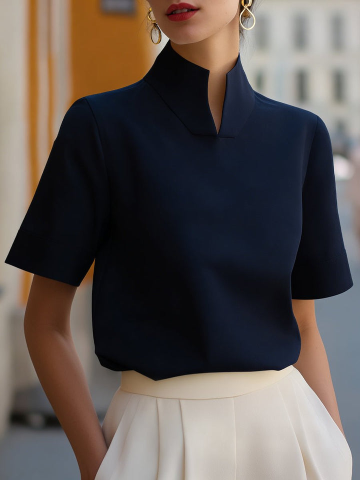 Elegant women's short sleeve blouse with a mandarin collar, relaxed fit for versatile style.