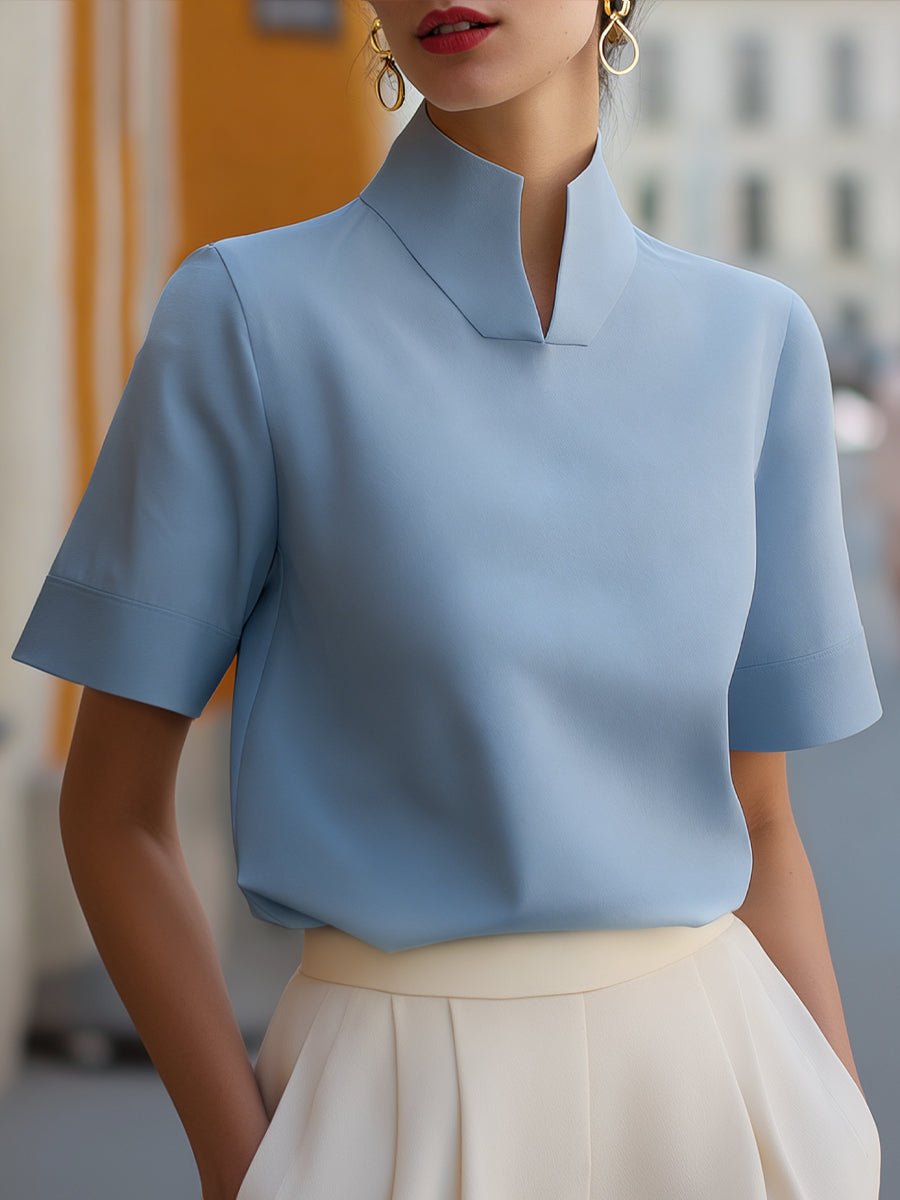 Workwear ready: women's relaxed fit short sleeve blouse, sophisticated stand collar.