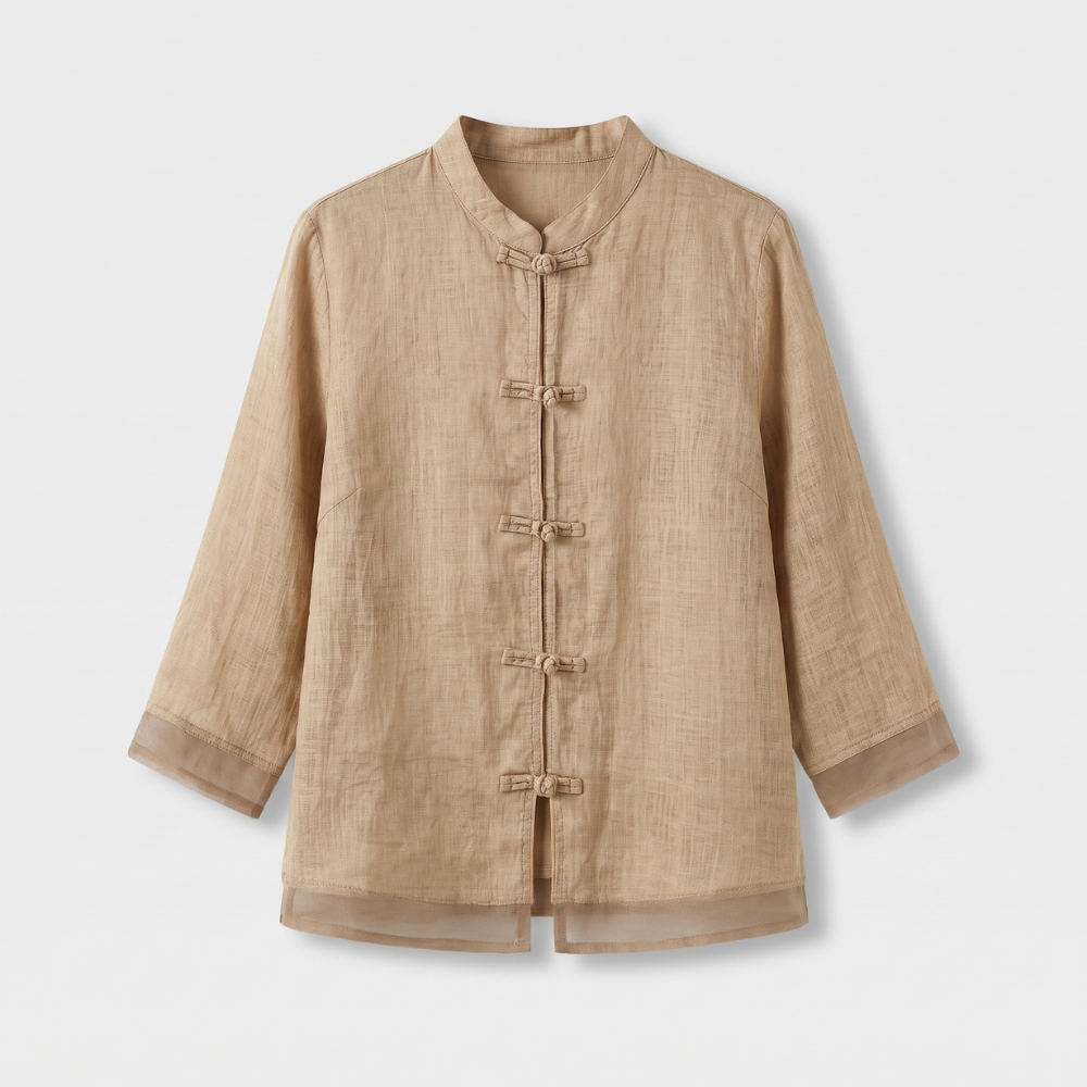 Elegant women's blouse with a stand-up mandarin collar and traditional frog button fastening.