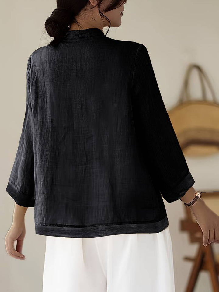 Women's versatile mandarin collar top with frog buttons, perfect for spring/summer office & casual.