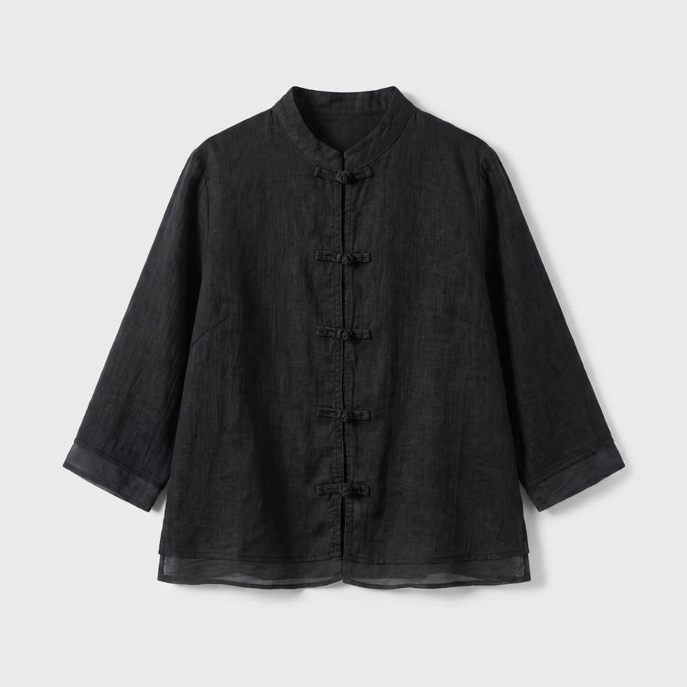 Casual yet elegant women's blouse with mandarin collar, frog buttons, ideal for warm weather.