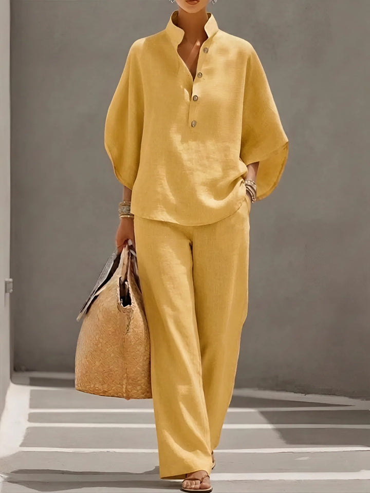 Versatile women's mandarin collar two-piece set with wide-leg pants for casual or elegant wear.