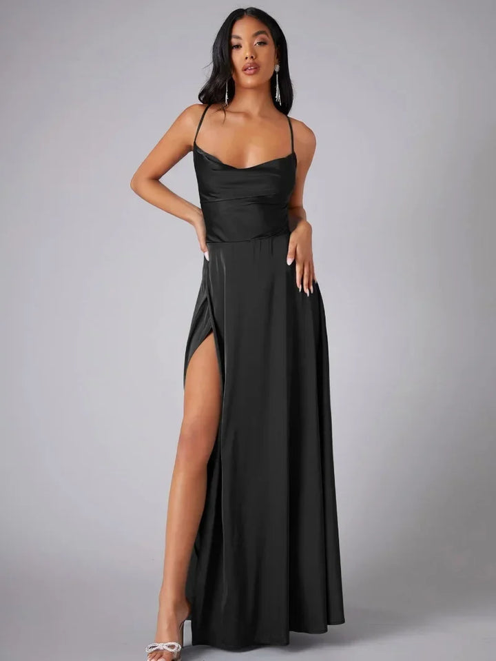 Stylish women's evening gown, ideal for parties, with a dramatic high slit, open back, & elegant maxi length.