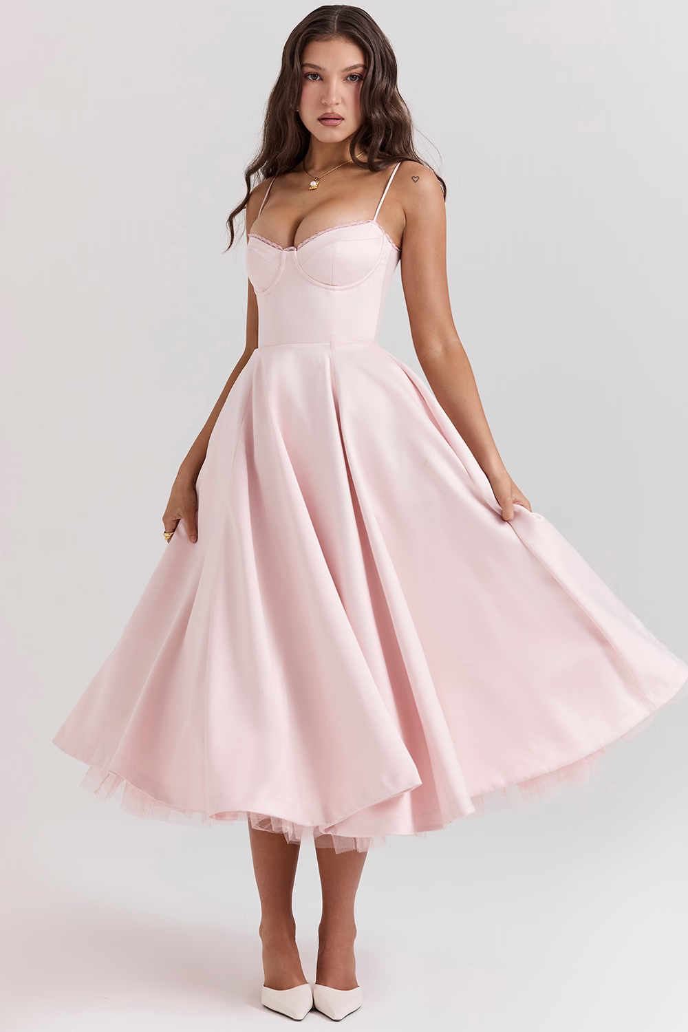 Women's elegant midi occasion dress, lace-trim corset, sweetheart neckline, pockets, and tulle hem.