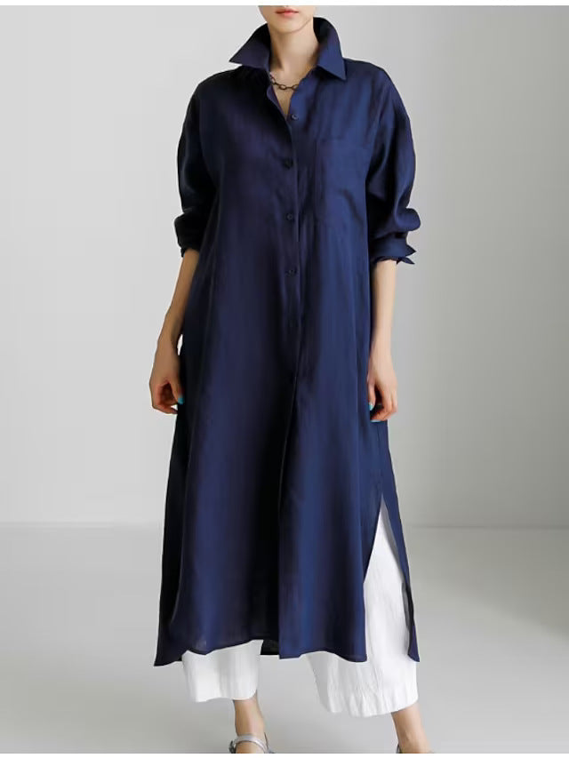Stylish women's midi shirt dress with a button-down front, roll sleeves, and chest pocket. Great for spring.