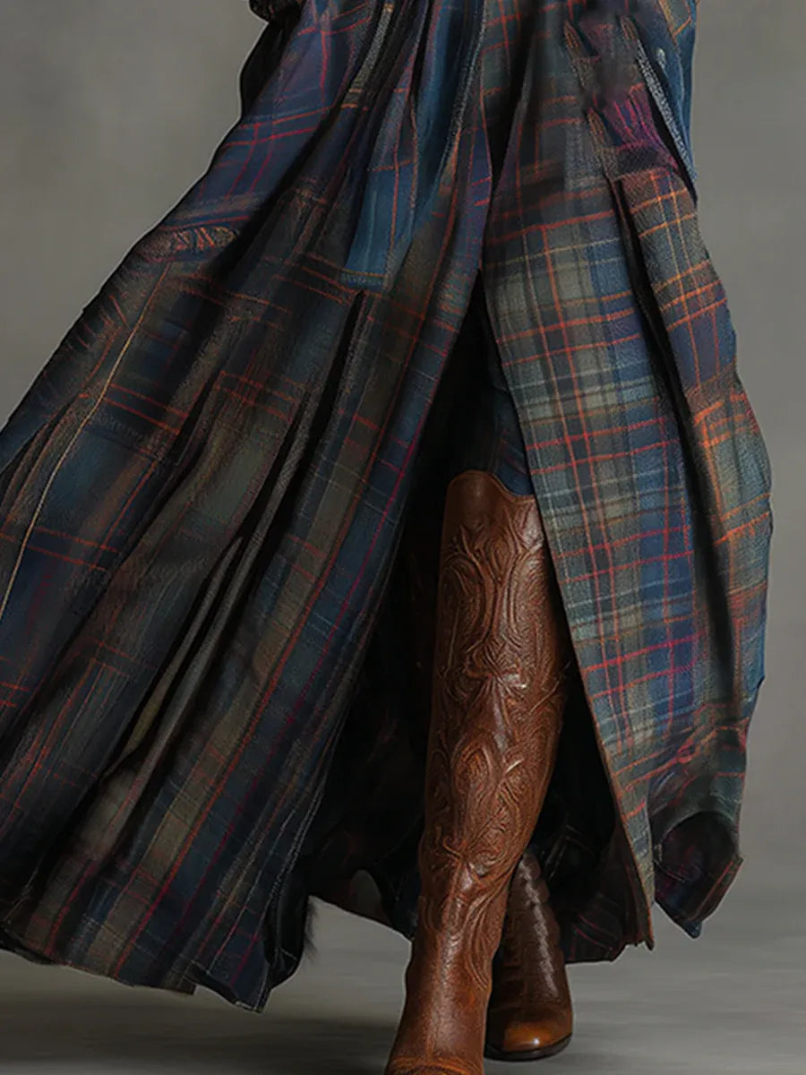 Fitted women's navy blue maxi dress with elegant long sleeves & a distinctive plaid skirt, a perfect statement for winter.