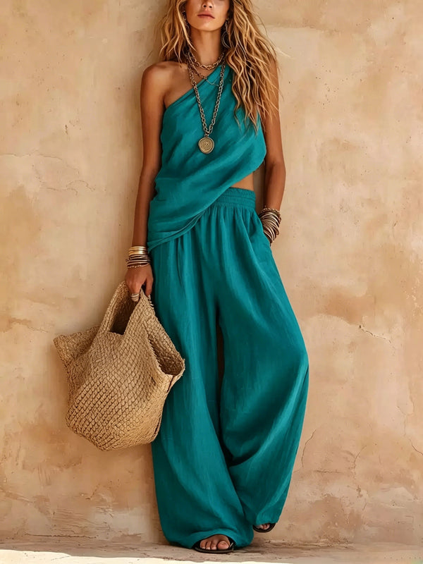 Draped one-shoulder wide-leg women's jumpsuit, offering an elegant and flowing silhouette for any occasion.