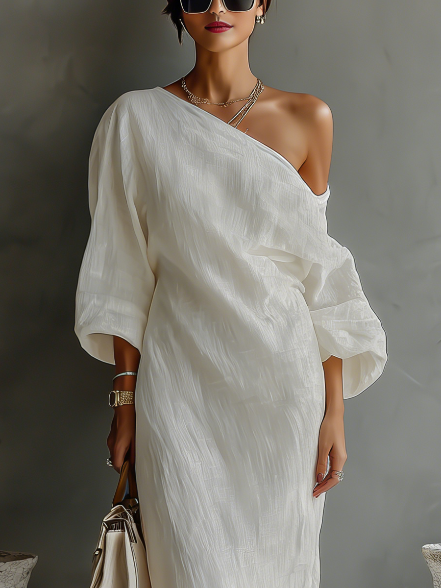 Elegant one-shoulder long sleeve flowing maxi dress, ideal for sophisticated formal events.