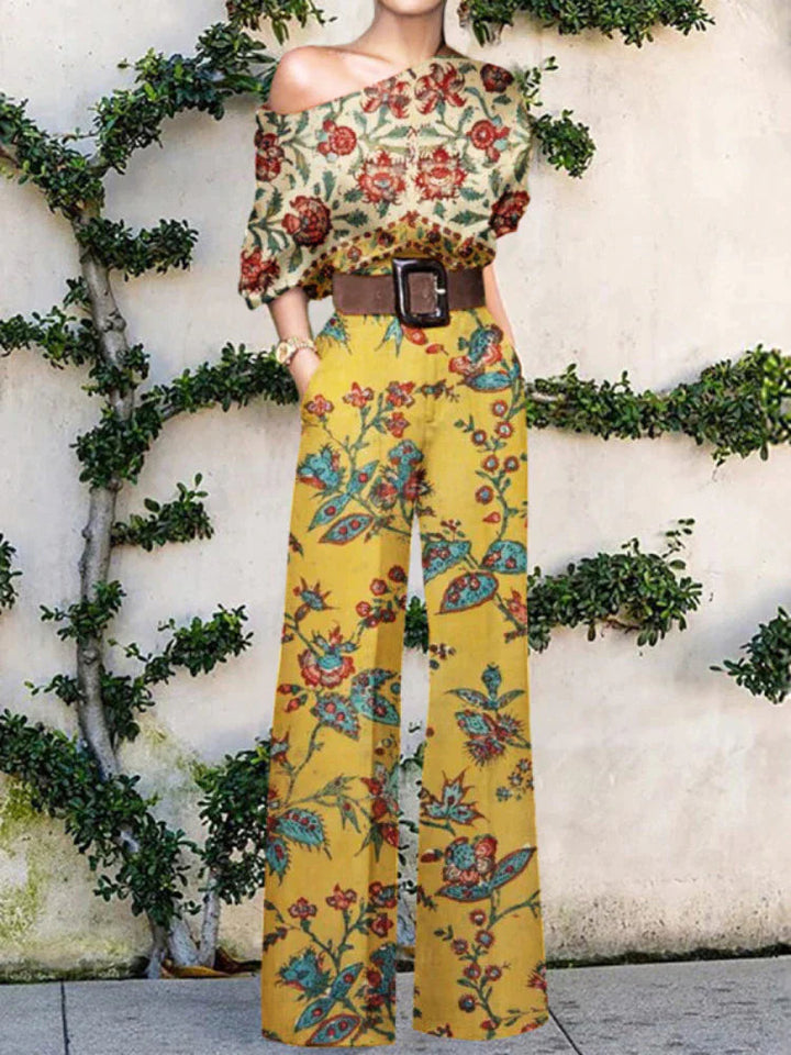 Elegant women's one-shoulder wide leg printed jumpsuit. A sophisticated choice for any party or resort getaway.