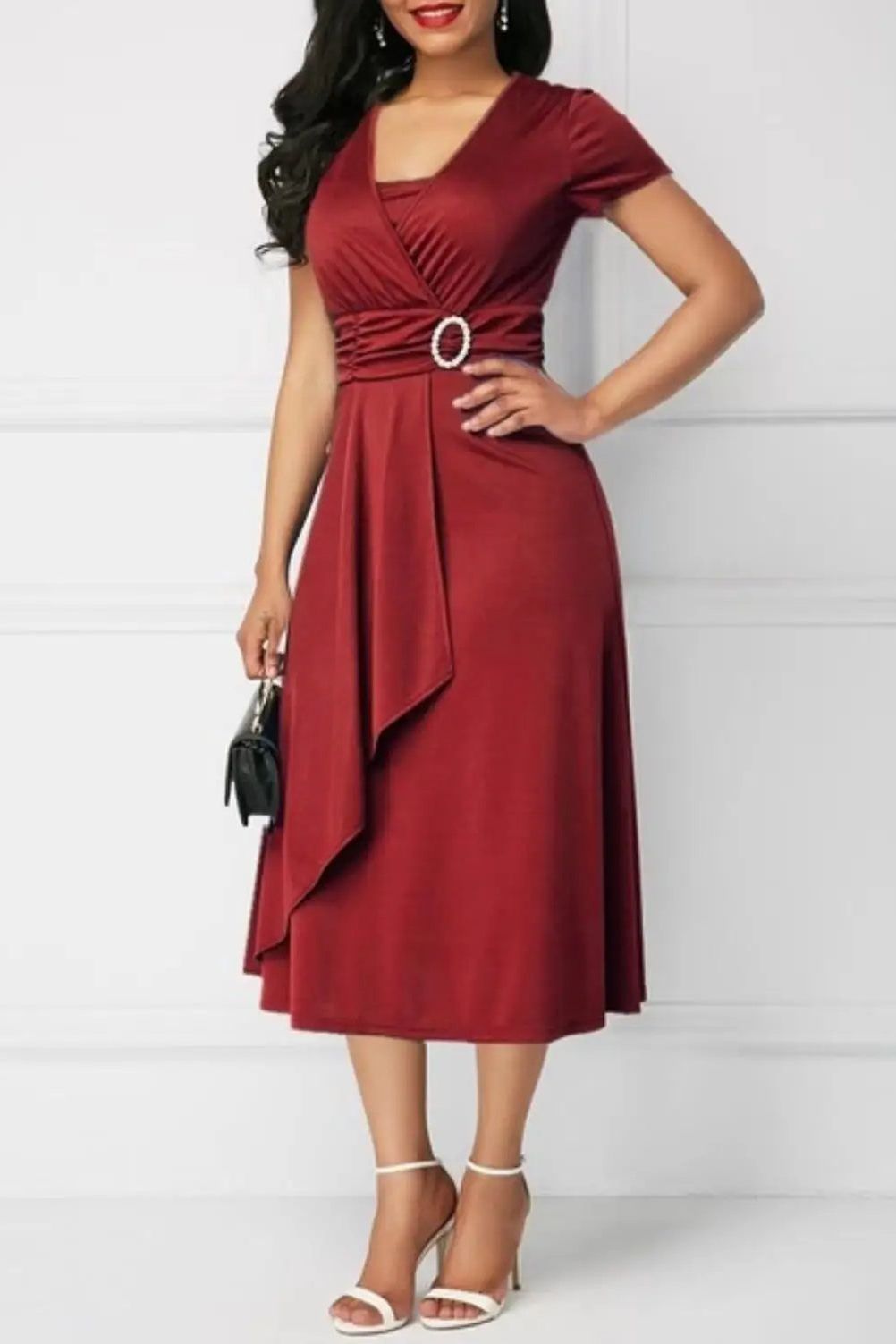 Women's elegant patterned midi dress, perfect for day or evening, offering sophisticated effortless style and comfort.