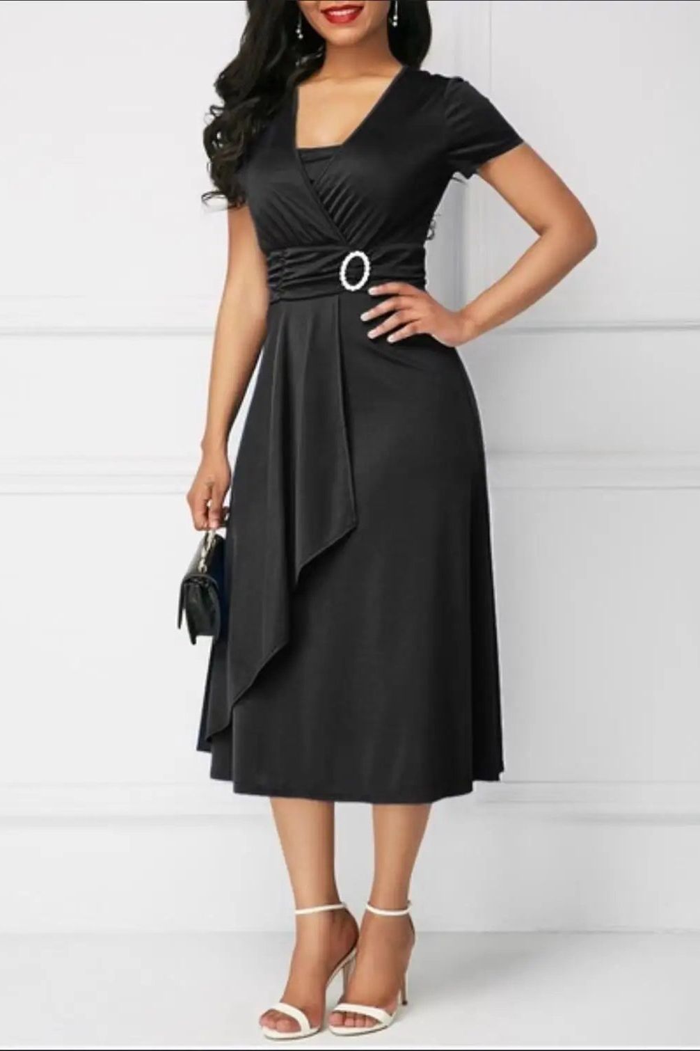 Relaxed fit women's midi dress with an elegant pattern, ideal for comfortable casual day wear or versatile styling.