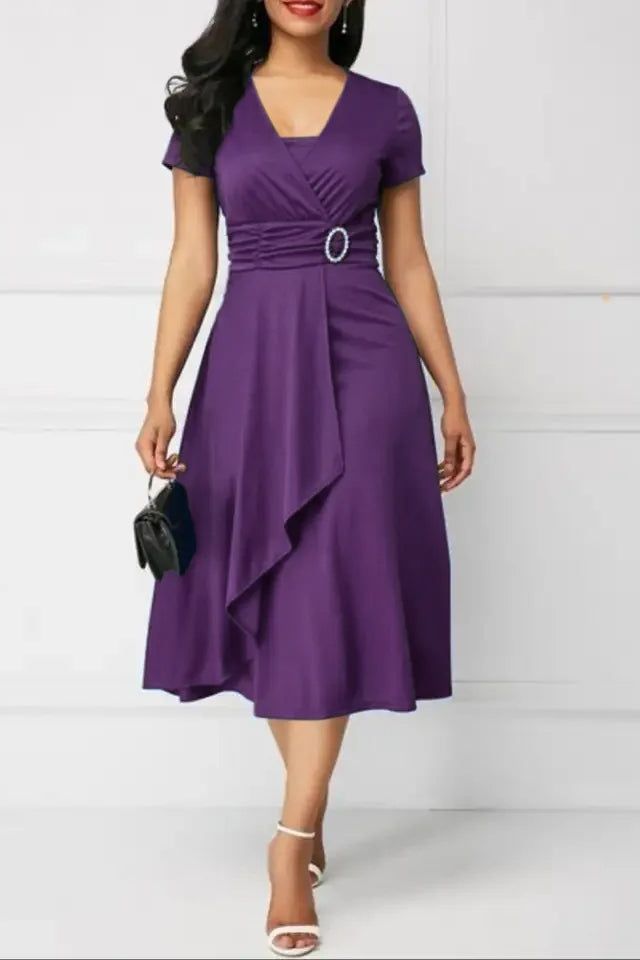 Sophisticated women's patterned midi dress, elegant and chic, perfect for effortless style and special occasions.