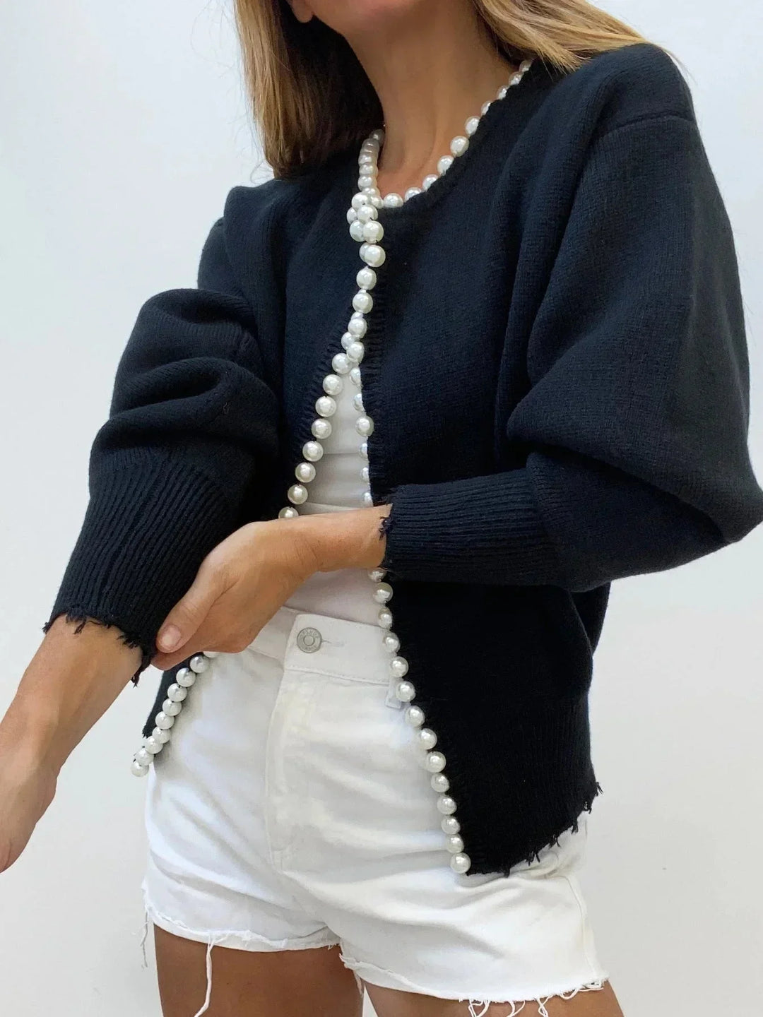 Round neck women's cardigan sweater with elegant pearl trim, long sleeve for comfortable, stylish wear.