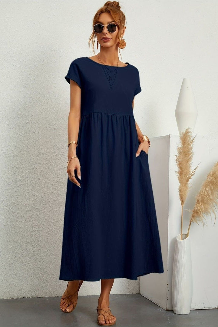 Comfortable & stylish women's elegant pleated midi dress. Versatile for many occasions.