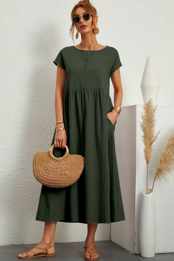 Versatile women's midi dress with a flattering pleated design. Comfortable & chic for summer.